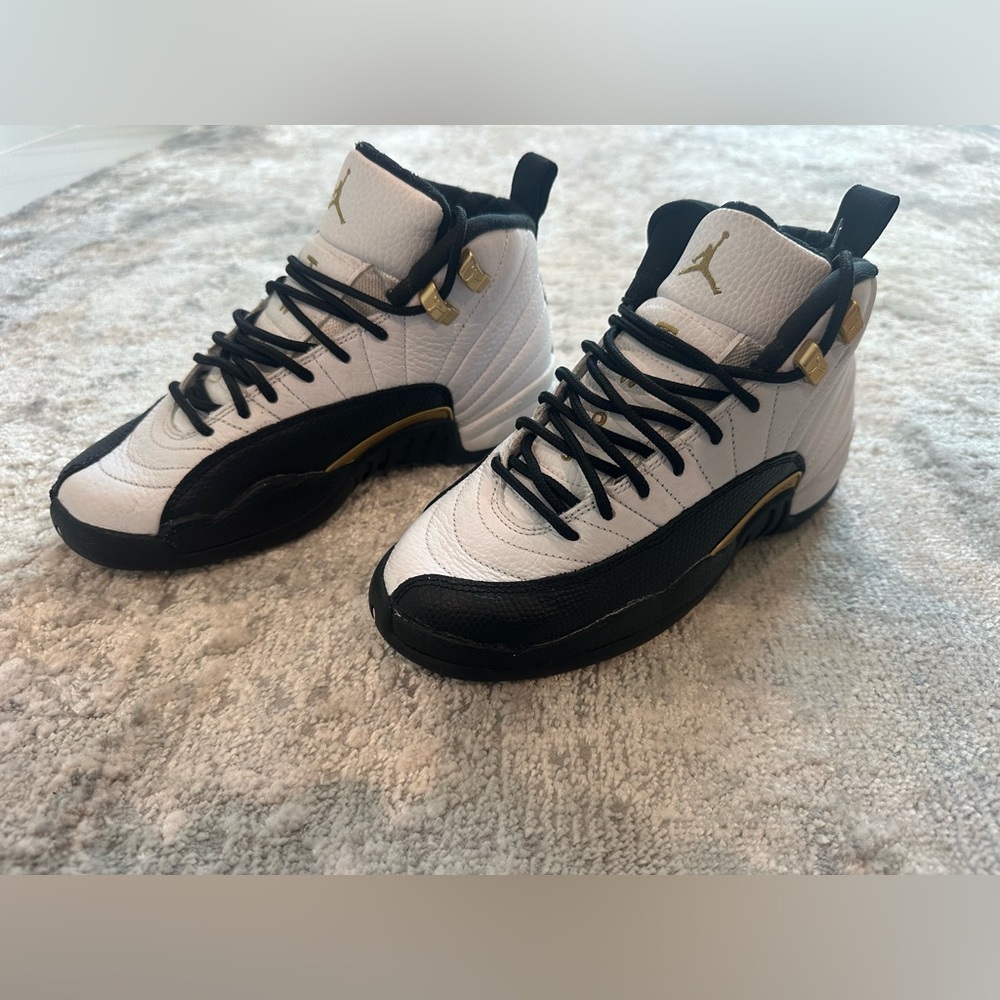 Pre-Owned (worn twice) DS Size 4y GS - Jordan 12 Royalty Taxi. Color White/Gold
